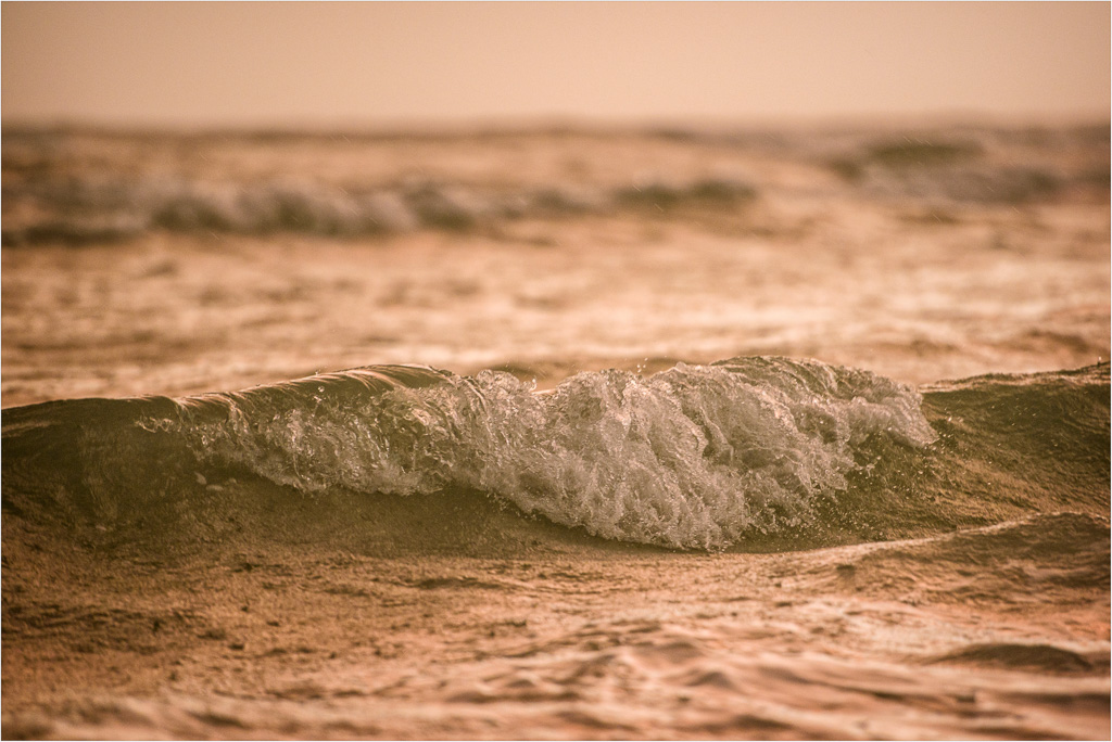 Rainy-Waves-At-Sunset.jpg