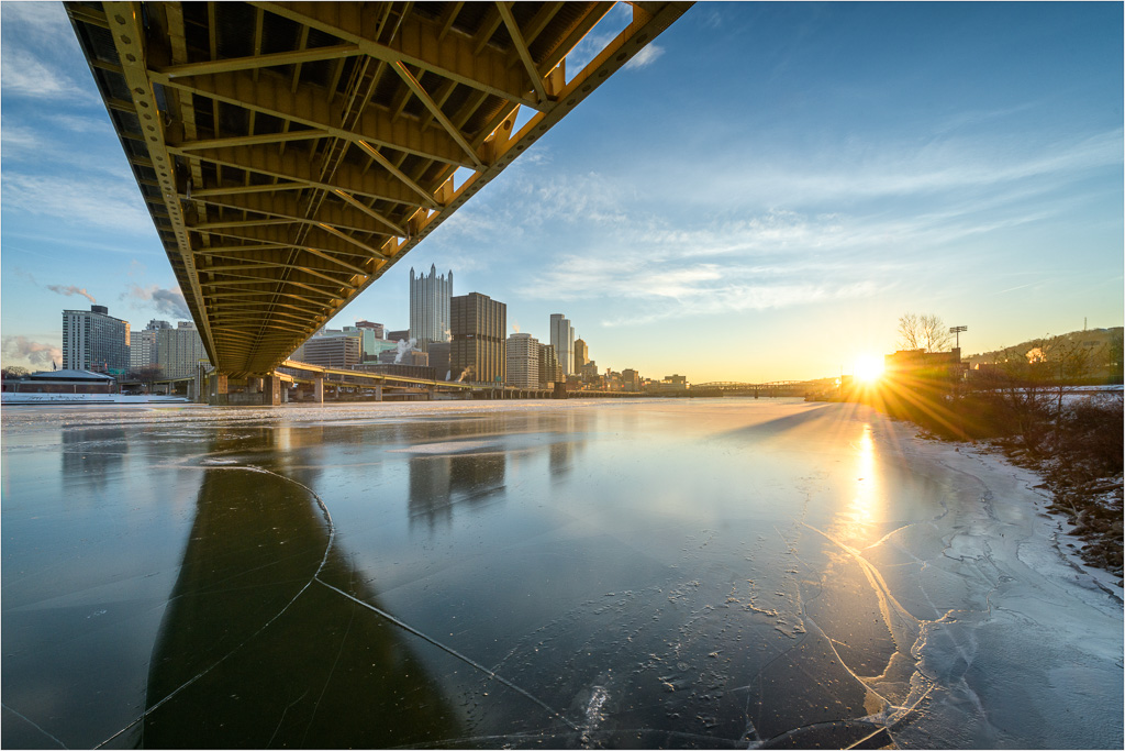 The-Fireball-Rises-Over-An-Ice-Covered-Mon.jpg